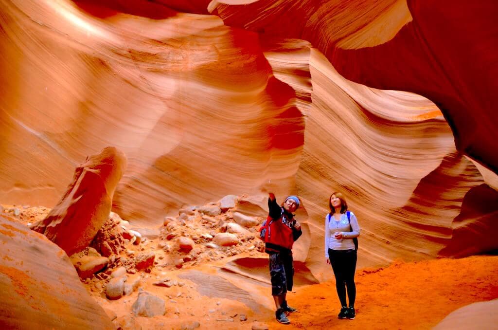 Wander through the winding golden corridors of Antelope Canyon
